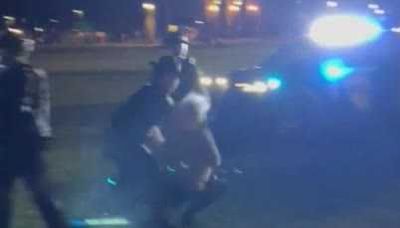 Raw video: Dartmouth professor pushed to ground, arrested during protest