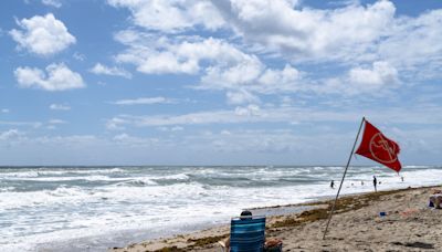 Tropical disturbance seen from space as weather warnings issued in Florida