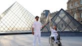 Artist JR Carries the Olympic Torch Through the Louvre | Artnet News