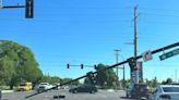 Lifted dump truck bed tears down Vancouver traffic signals, causes $100K in damage