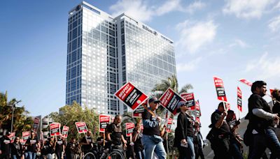 Hundreds of hotel, service workers rally in downtown San Diego for $25-an-hour minimum wage