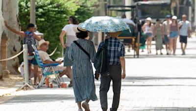 Southern Europe broils as Dutch celebrate belated summer conditions