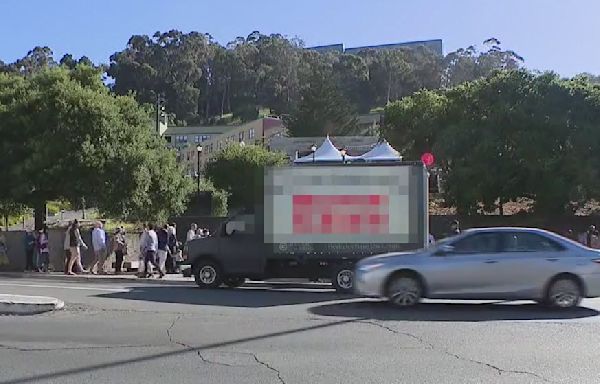 Controversial billboard outside UC Berkeley law school graduation