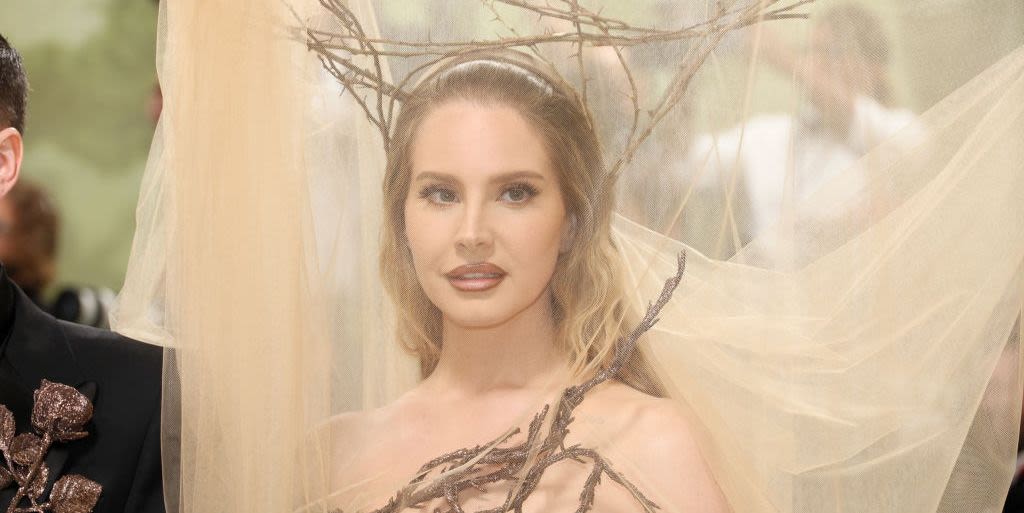 Lana Del Rey’s 2024 Met Gala Look Is Completely Sheer and Decked Out in Tree Branches