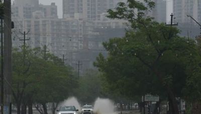 Greater Noida Rain Turns Fire Extinguishers into Fountains in a Posh Locality, Video Goes Viral - News18