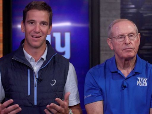 Giants football legends Eli Manning, Tom Coughlin give back to the community