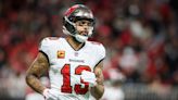 Mike Evans planned to test free agency until his wife spoke up