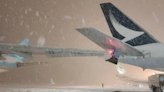 Aircraft Touch Tips During Blizzard At Japanese Airport