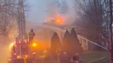 Firefighter taken to hospital, roof collapses in raging blaze that tore through Norton home