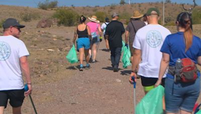 Dozens of volunteers clean up Papago Park in Phoenix for Earth Day