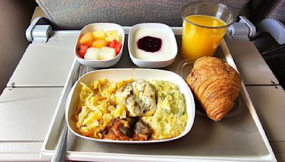 I'm a travel writer and I secretly LOVE plane food - here's why