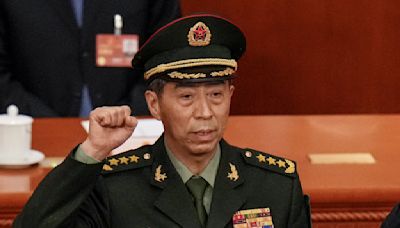 China expels 2 former defense ministers from its ruling Communist Party over graft allegations