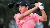 Charlie Woods shoots career-best round to win junior golf tournament – with dad Tiger on the bag