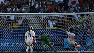 Two stoppage time goals give Japan shock win over Brazil; USA later