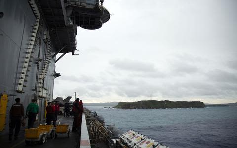 USS Abraham Lincoln sailors, en route to Middle East, stop in Guam for rest and relaxation