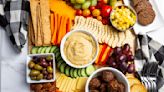 What goes on a vegan 'charcuterie' board? From dried fruits to plant-based cheese, get snacking ideas that will please any guest