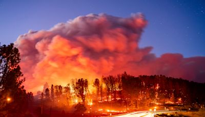 Wildfire sparked by a burning car triples in size in a day. A 42-year-old man is arrested