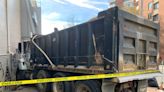 Truck hits building in Northwest DC
