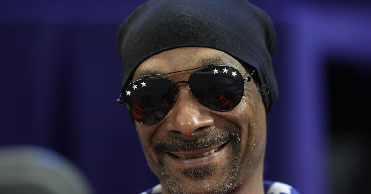 Mark Kiszla: Reefer madness! Snoop Dogg has stolen the show in Paris and become the new lord of the Olympic rings