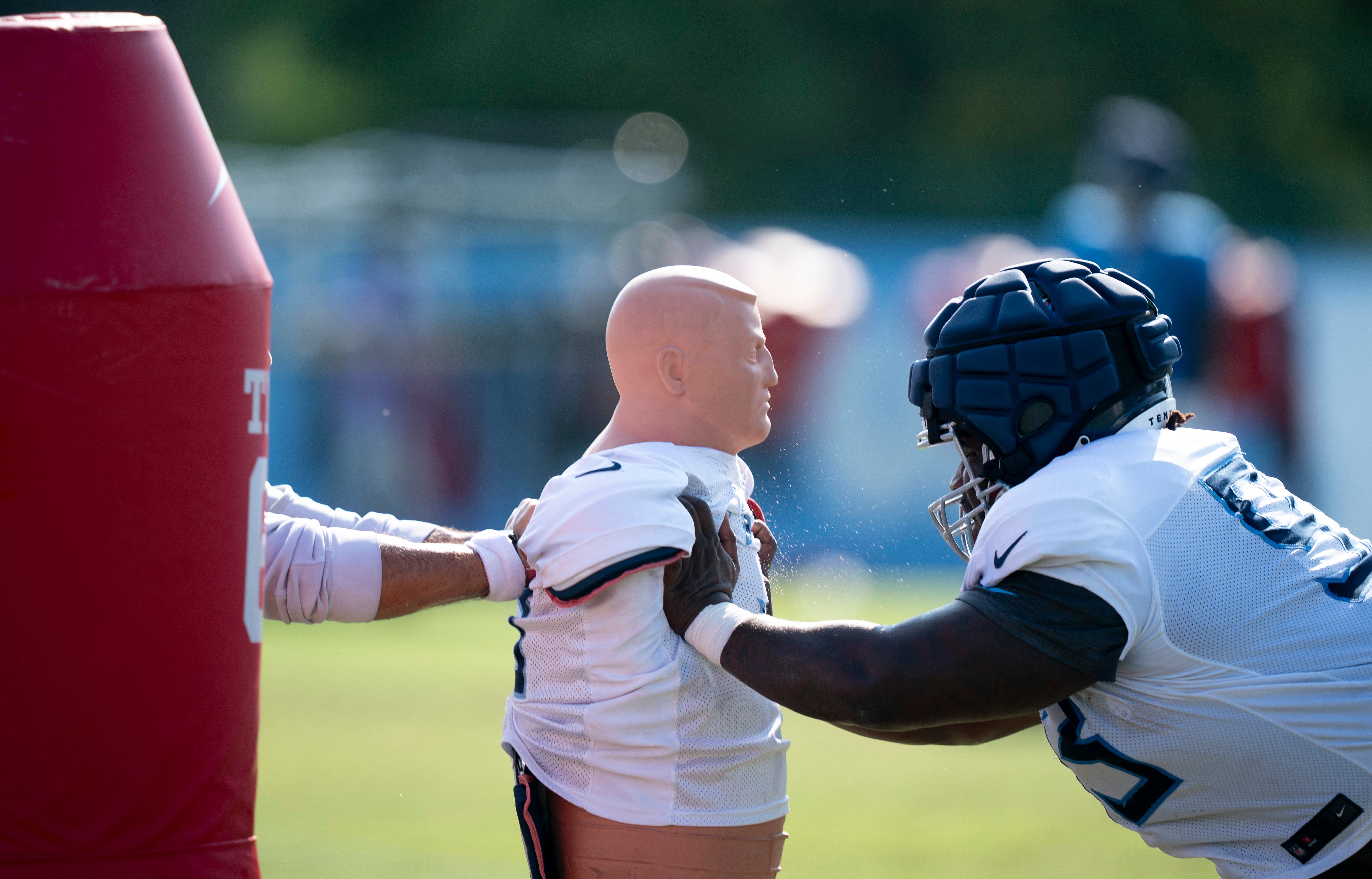 Jeffery Simmons, T'Vondre Sweat work with Tennessee Titans DL coach Tracy Rocker