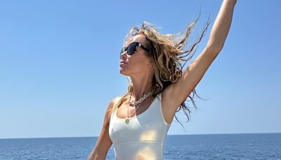 Amanda Holden, 53, looked incredible in a metallic swimsuit in Greece