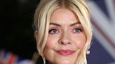 Holly Willoughby looks stylish in navy knitted dress