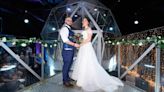 Mum-of-two whose proposal came on a scavenger hunt has “game show-style” wedding at Manchester’s Crystal Maze Live Experience dome
