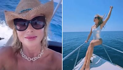 'Topless' Amanda Holden poses on speedboat on romantic Greek trip with husband