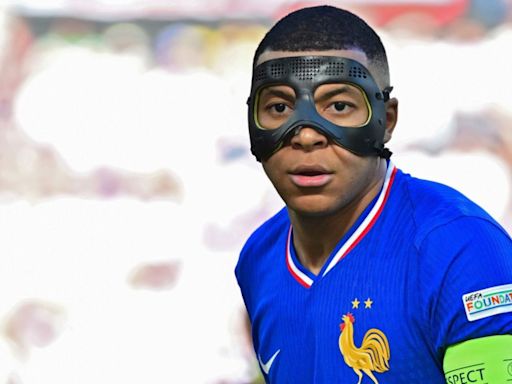 Why is Kylian Mbappe wearing a mask against Portugal at Euro 2024?