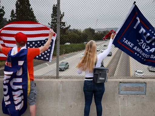 Trump fans turn US flags upside down to protest former president’s conviction