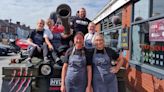 Eddie Hall rocks up at diner in trademark tank