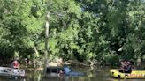 Driver rescued after Jeep becomes stuck in high water in Clarksville