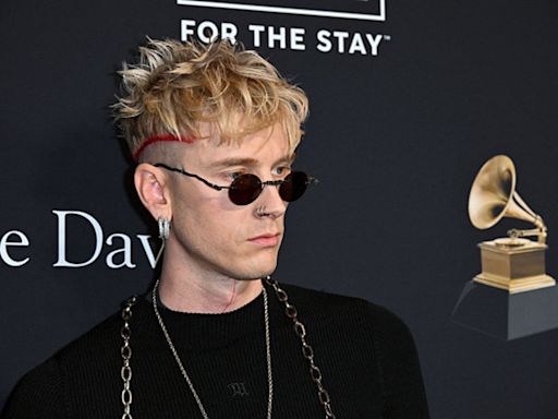 Machine Gun Kelly debuts new fang teeth in dentist’s office