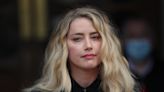 Embattled Amber Heard has ‘quit Hollywood’ for new start in Madrid