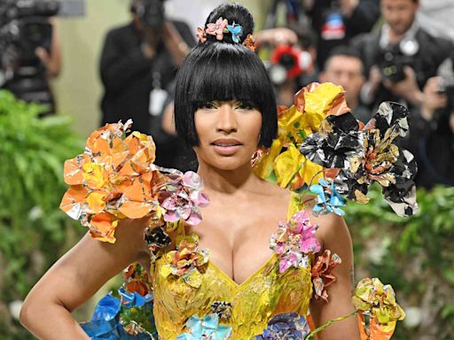 Nicki Minaj Brings on the Blooms — and Bold Poses! — in Flower-Covered Minidress at 2024 Met Gala