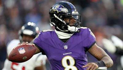 Troy Aikman offers to have beers with Lamar Jackson to help settle legal dispute