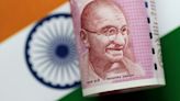 Rupee declines as early election trends spur dollar buying