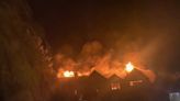 Dramatic image captures moment fierce orange flames tear through Coventry care home