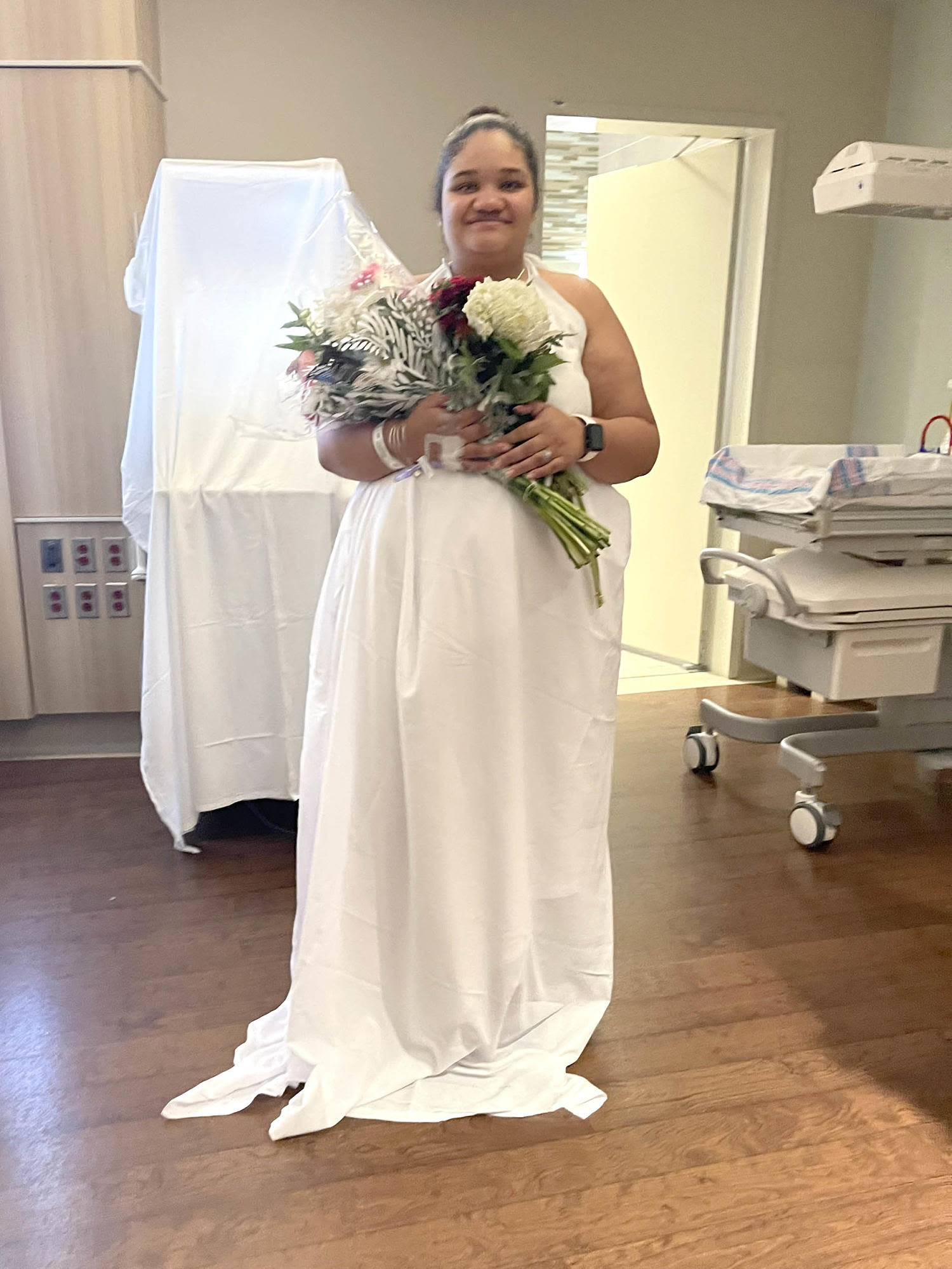 Pregnant bride gets married in hospital wearing ‘wedding dress’ of bed sheets