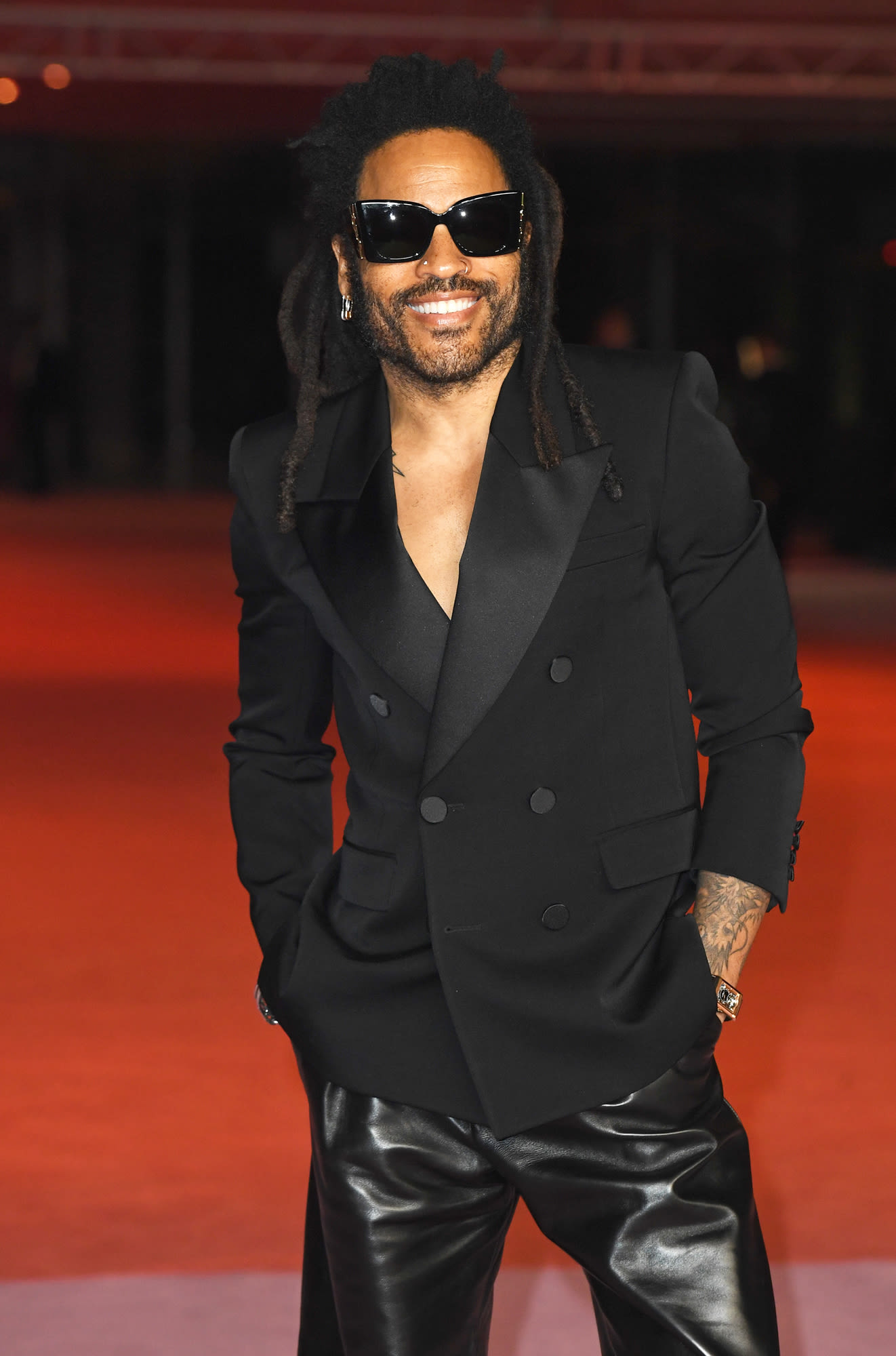 Lenny Kravitz’s Trainer Explains Why Singer Wears Leather Pants to the Gym: ‘He’s Different’