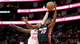 Butler scores 22 to lead the Heat to a 119-104 victory over the Rockets