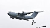 Military aircraft parachutes payloads over Wiltshire