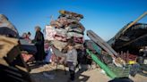 The Latest | First shipment of humanitarian aid leaves for US-built floating pier off Gaza