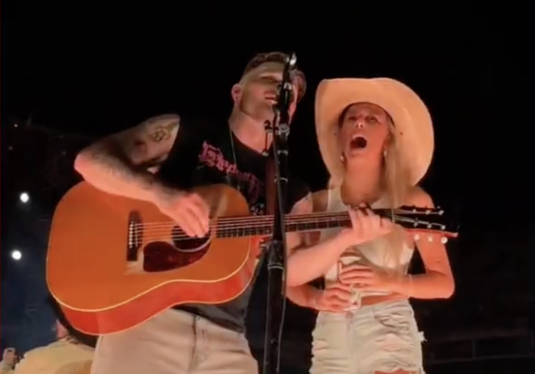 Watch Zach Bryan Bring the ‘Hawk Tuah’ Girl Onstage at Nashville Concert