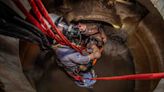 Off-season training: Palm Beach Fire Rescue crews practice in tight, underground spaces