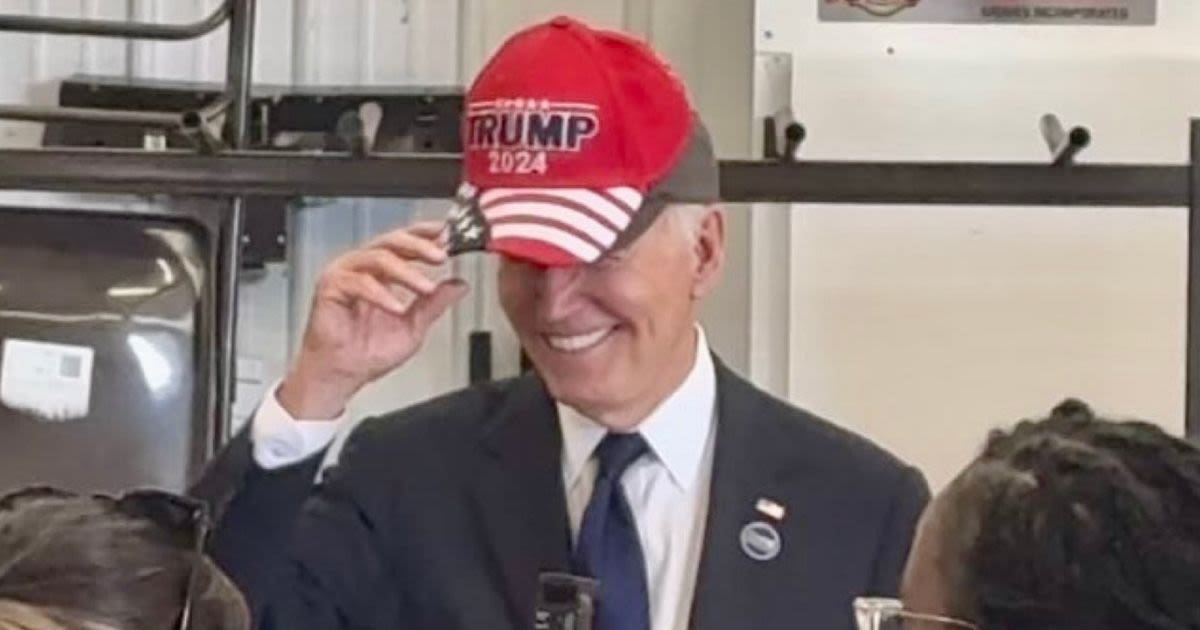 Joe Biden wears Trump MAGA hat as he's called 'old fart' by supporter