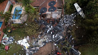 Brazil plane crash latest: Removal of bodies begins after plane crashes near Sao Paulo, killing 62 passengers