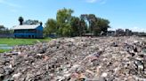 They study next to one of Africa's largest trash dumps. They're planting bamboo to try to cope