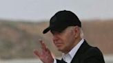 US President Joe Biden steps off Air Force One upon arrival at Los Angeles International Airport