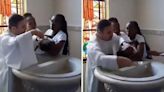 Bautismo brutal en Brasil: un cura tiró del cuello a una beba que lloraba en brazos de su mamá